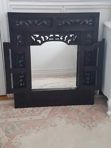 Mirror with beautiful carved wooden frame