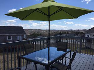 Patio table, umbrella, and 4 chairs
