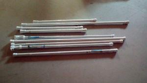 VARIETY OF SHOWER RODS NEWER