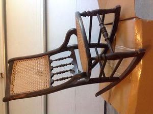 Antique small rocking chair with new seat and back
