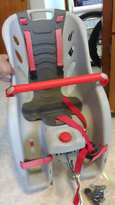 Baby rear mount seat carrier.