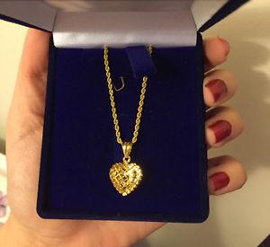 Beautiful 21k gold necklace and heart charm