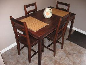 Like new Solid Wood Table With 4 chairs