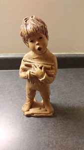 Little Boy Firewood Statue