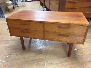 Low, wide teak chest of drawers