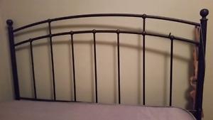 Metal queen bed frame.