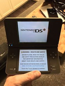 Nintendo DSI XL with case and game