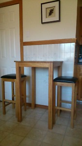 Oak table and two stools