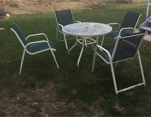 Patio Table And 4 Mesh Chairs