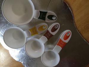 Plastic measuring cups & Spoons $5.00
