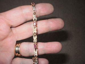 STERLING SILVER BRACELET WITH RUBIES