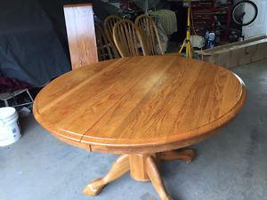 Solid oak table and 4 chairs