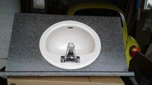 Toilet, sink and vanity top