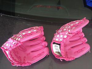 Two pink Wilson tball gloves