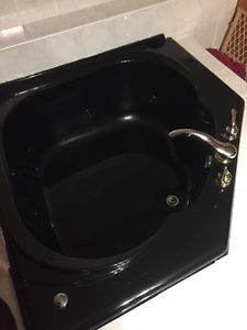 Whirlpool tub, vessel sink and taps