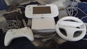 Wii U Console with gamepad, extra controller and wheel