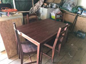 Wooden kitchen table and four chairs