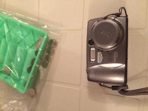 Digital camera with SD card and batteries