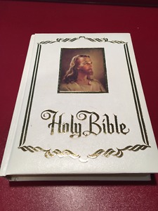 Large white bound bible
