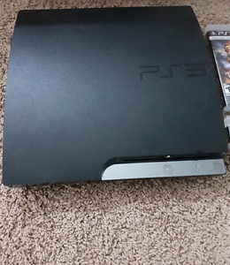 PS3 with 2 controllers and games ($150)