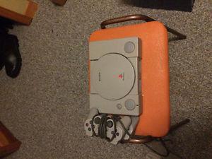 Ps1 console, several controllers, memory cards,