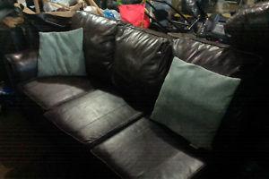 A brown leather couch in excellent condition