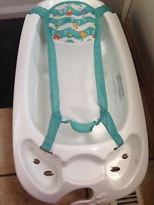 Bath with sling