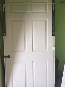 Brand new 36" pre hung door and 8x10 garage door