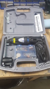 Dremel 300 with hole cutter attachment