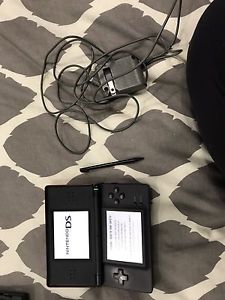 Nintendo DS lite plus charger and games
