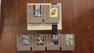 Nintendo NES and one controller with 6 games.