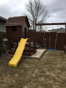 Outdoor playhouse and swing set