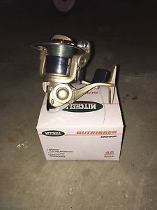 Outrigger fishing reel