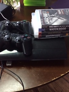 PS3 with contollers and 6 games