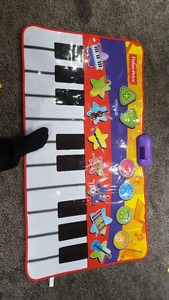 Piano floor mat