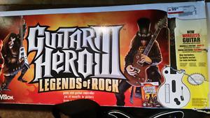 Wii guitar hero guitar (2) as pictured and game