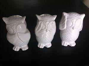 3 white decorative owls