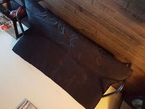 Black futon less than a year old hardly used