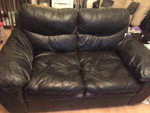 Black leather love seat