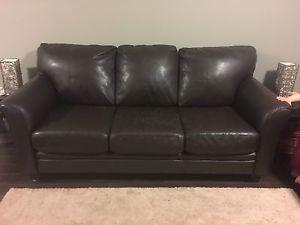 Espresso faux leather couch and love seat