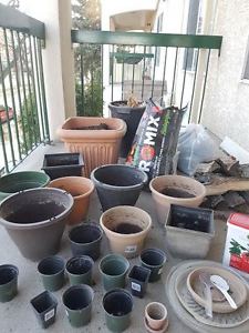 Gardening pots, soil,and fireplace wood