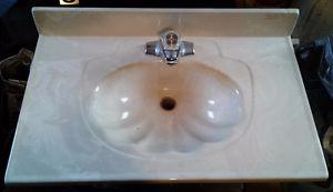 One-piece molded bathroom sink with faucet, 19" x 31"