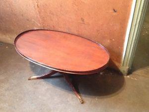 Oval mahogany coffee table.