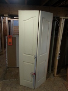 2 Bi-Fold Doors - $25 each obo