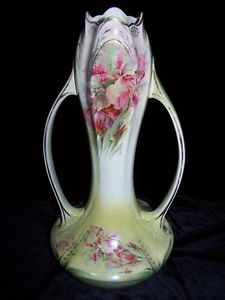 ANTIQUE HAND PAINTED TALL VASE WITH FUNKY HANDLES.