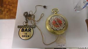 Backwards running bar clock vintage 's