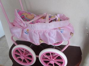 DOLL CARRIAGE AND LAUGHING DOLL