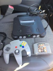 Nintendo 64 with 2 controllers Zelda and wrestling game