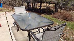 Patio table with 4 chairs.