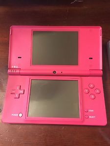 Pink DSI with case, charger, and games